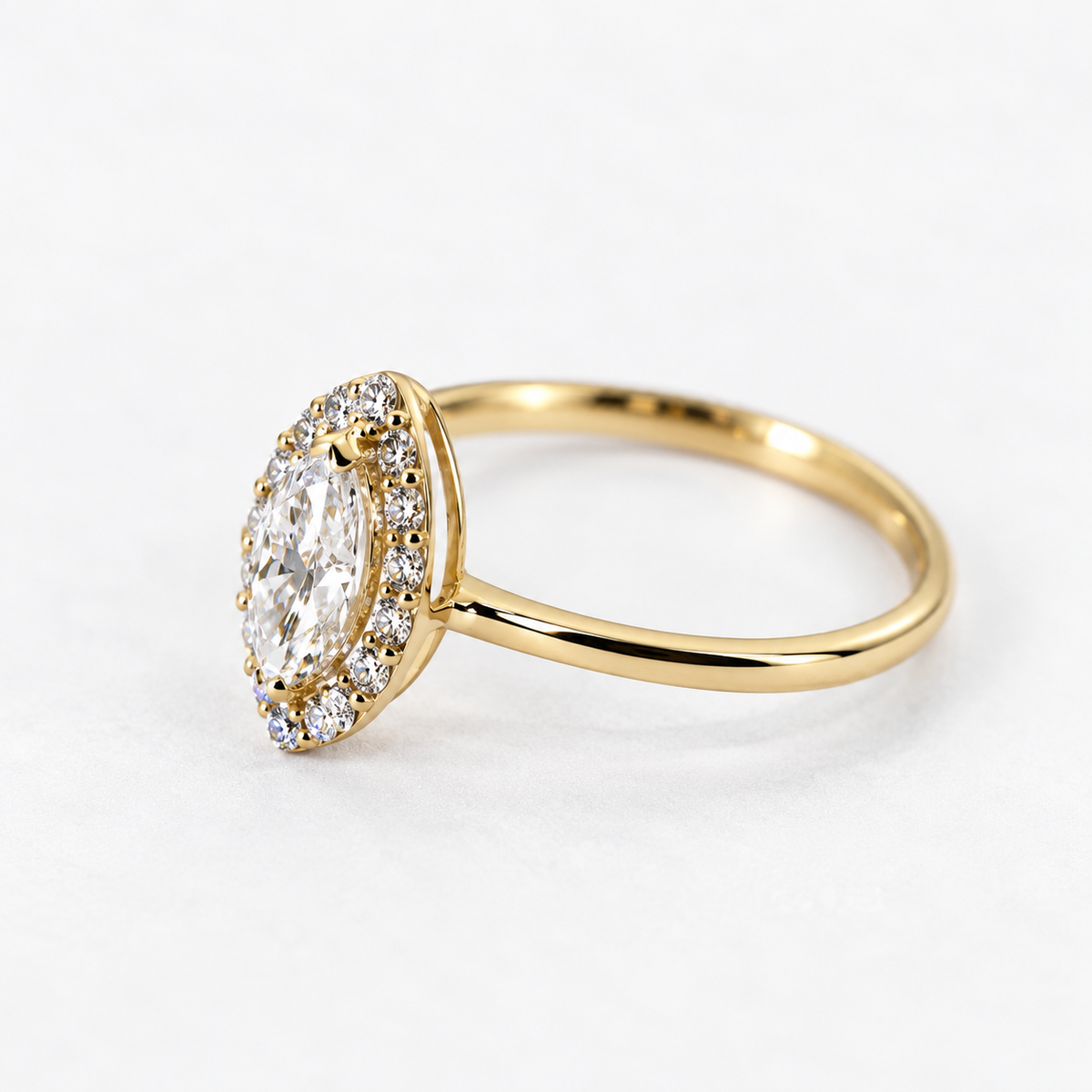 Lab Grown DiamondMarquise Cut Diamond Halo Engagement Ring in 14K Yellow Gold